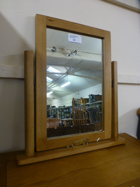 An oak dressing table top mirror (69.