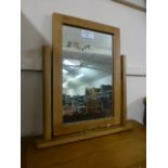 An oak dressing table top mirror (69.