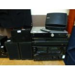 A Sony amplifier, Aiwa tape player, Marantz CD player and an Acoustic Solutions stereo amplifier,