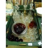 A tray containing an assortment of glassware to include drinking vessels,