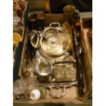 A tray containing an assortment of items to include plated tray, brush, goblets etc.