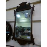 An early 20th century 18th century style fretwork mirror