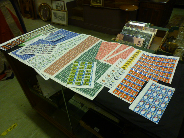 A quantity of stamps to include full sheets