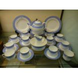 A blue and gilt decorated Royal Worcester tea set comprising of plates, cups, saucers, teapot etc.