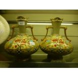 A pair of 18th century style Old Hall ceramic twin handled vases with gilt and floral decoration