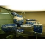 A selection of blue and white ceramic ware to include water jug, bowls etc.