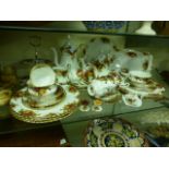 A part Royal Albert Old Country Roses tea set comprising of cake stand, cups, saucers, coffee pot,