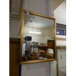 A rectangular gilt framed wall mirror