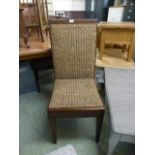 A set of four hardwood framed and reed upholstered dinning chairs