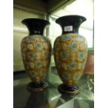A pair of Doulton gilt and turquoise decorated vases