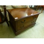A reproduction mahogany effect cabinet with pull down front