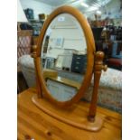 A modern pine swing dressing table mirror