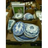 Two trays of mainly blue and white ceramic ware to include meat plates, tureens etc.