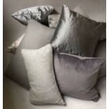 CUSHIONS, an assortment of nine, in grey and silver fabrics.