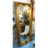 WALL MIRROR, Continental style gilt with shell, scroll,