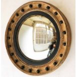 REGENCY CONVEX WALL MIRROR, giltwood circular, ebony slip and sphere decorated frame, 65cm diam.