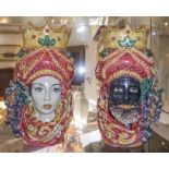 CALTAGIRONE MAIOLICA VASES, a set of two, in the form of a Moorish man and woman,