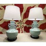 TABLE LAMPS, a pair, Chinese celadon ceramic with ebonised bases and shades, 55cm H.