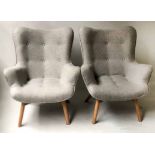 ARMCHAIRS, a pair, 1970's grey cotton upholstered with button back and splay supports.