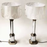 LAMPS, a pair, chrome and silvered metal columns, 72cm H with shades.