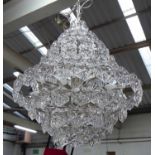 CHANDELIER, large glass chandelier on chrome metal frame, 110cm x 80cm W.