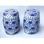 STOOLS, a pair, Chinese blue and white ceramic of barrel form and pierced detail, 46cm H.