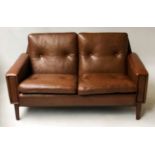 SOFA, 1970's Danish teak with mid brown leather upholstered cushions and tapering supports, 135cm W.