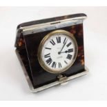 SILVER AND TORTOISESHELL TRAVEL CLOCK, marked London 1930, the time piece marked for 'H.