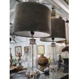 TABLE LAMPS, a pair, with glass bodies with shades, 61cm H.