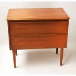 CHEST, 1970's teak with two long drawers integral handles and tapering supports,