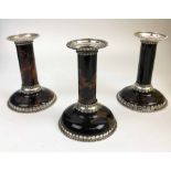 SILVER AND TORTOISESHELL CANDLESTICKS, three, marked William Comyns London, approx 12cm H.