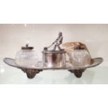 SILVER DESK STAND, two fitted clear glass ink wells, centre container with mariner figure, finial,