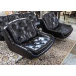 SWIVEL ARMCHAIRS, a pair, circa 1970's, with loose black leather buttoned back and seat cushions,