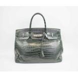 BIRKIN STYLE CROCODILE HANDBAG, by Gio Genco with silver tone hardware and bottom feet,