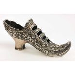 SILVER IMPORT SHOE, embossed trailing flower and leaf decoration, 12cm L, 2.