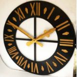 CLOCK FACE, architectural scale black and gilt with Roman numerals and gilt arrow hands, 200cm diam.