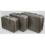 GUCCI SUITCASES, a graduated set of three, largest 70cm x 44cm x 20cm.