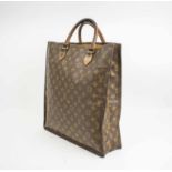 LOUIS VUITTON SAC PLAT, monogram canvas with leather top handles and brass hardware, open top,