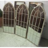 GARDEN MIRRORS, a set of three, Gothic style, metal framed, 66cm W x 159cm H.