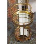 COCKTAIL TROLLEY, gilt metal framed of two circular mirrored tiers on wheels, 40cm diam x 77cm H.