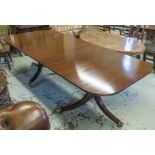 DINING TABLE, Regency style mahogany with two pedestals and an extra leaf,