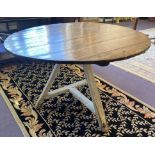 TILT TOP TABLE, 19th century Dutch pine, having planked circular top on painted tripod base,