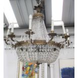 WITHDRAWN CHANDELIER, of substantial proportions, twelve branch, gilt metal with glass droplets,