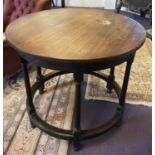 CENTRE TABLE, circa 1910, circular oak top on round stretchered supports, 89cm diam x 76cm H.