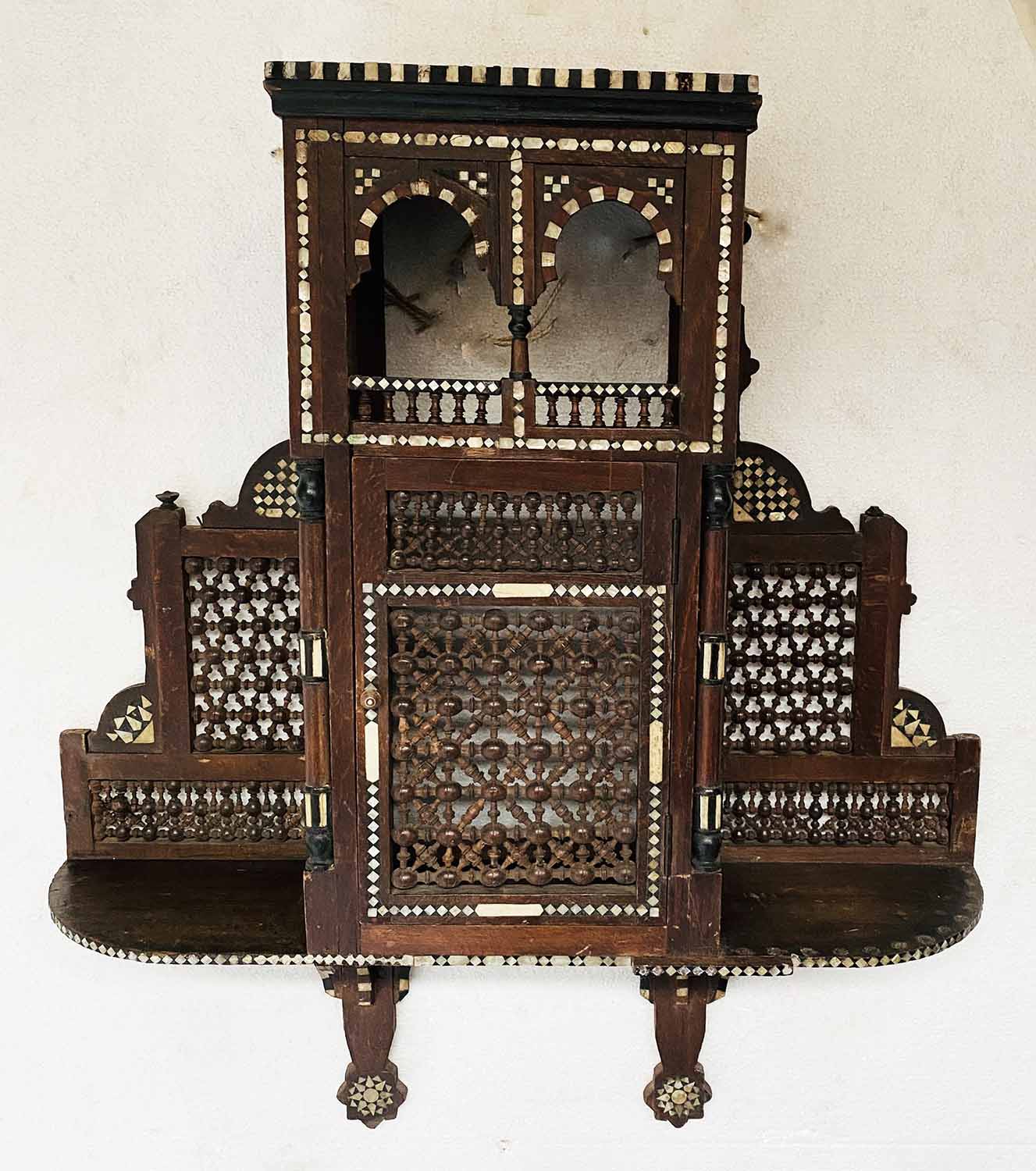 MOORISH WALL CABINET, early 20th century, bone and mother of pearl inset hardwood,
