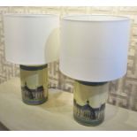 TABLE LAMPS, a pair, each showing the Louvre exterior with a white shade, 62cm H.