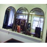 MIRRORS, a set of three, each with an arched top, 55cm W x 107cm H.
