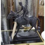 STATUETTE OF A POLO PLAYER, 25cm x 31cm H.