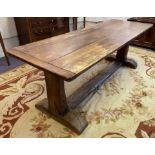 REFECTORY TABLE, 19th century Italian fruitwood and the oak planked top above a stretchered base,