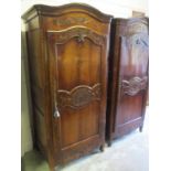 BONNETIERE, French Louis XV manner cherrywood with an arched cornice,